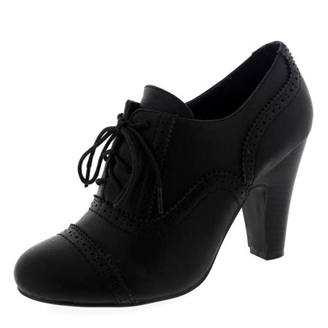 brogue heeled lace up boots.